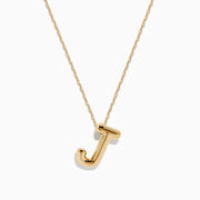 A 14K yellow gold Initial J Bubble Pendant with a delicate chain shown against a plain white background.