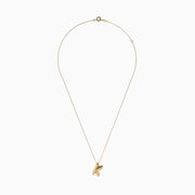 The 14K Yellow Gold Initial K Bubble Pendant features a bubble design initial on a delicate chain, shown against a plain white background.