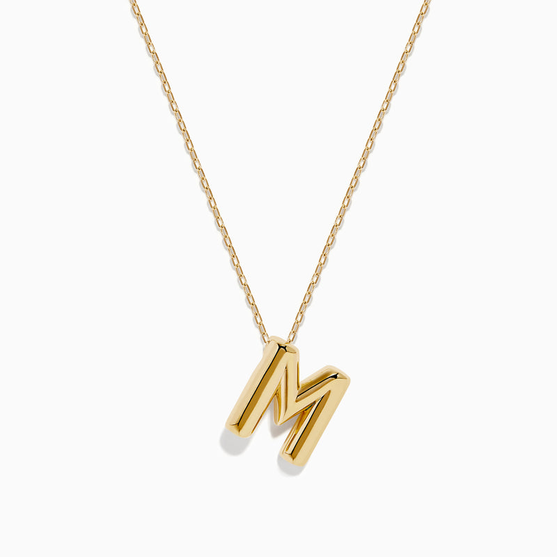 The 14K Yellow Gold Initial M Bubble Pendant is displayed on a thin chain against a plain white background.