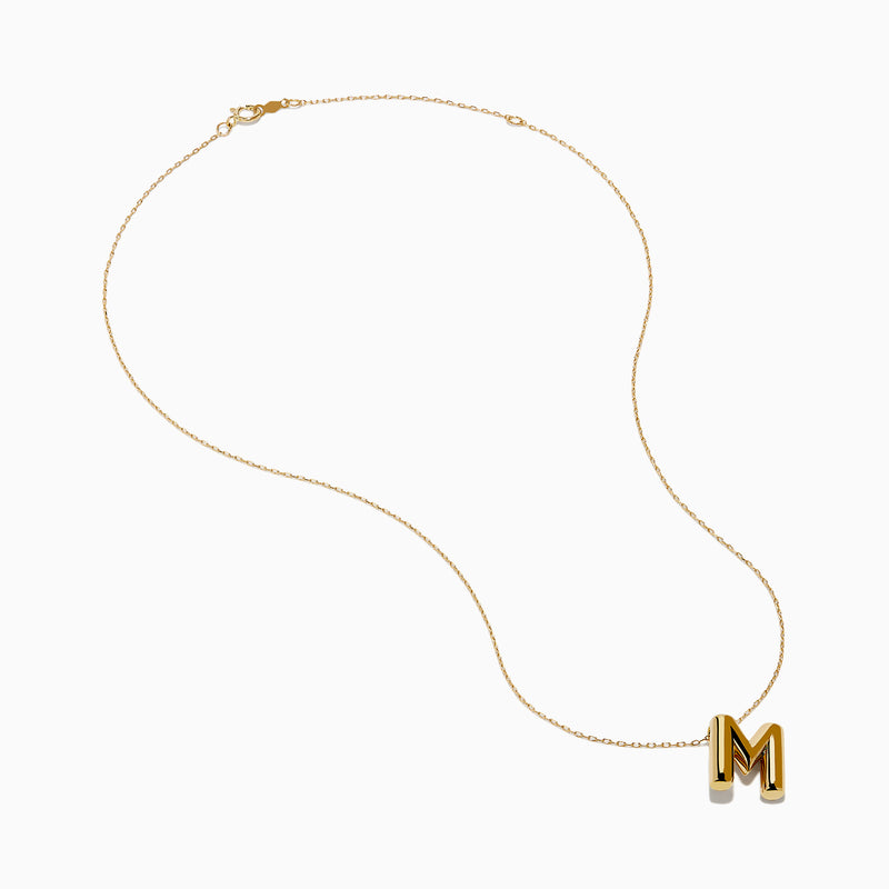 The 14K Yellow Gold Initial M Bubble Pendant is displayed on a thin chain against a plain white background.