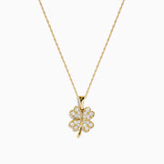 The DOro 14K Yellow Gold Diamond Clover Pendant is a delicate necklace featuring a sparkling diamond-encrusted clover pendant, shown on a plain white background.