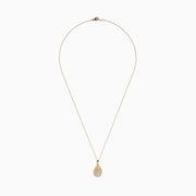 The 14K Yellow Gold Scattered Diamond Pendant features a teardrop-shaped diamond pendant partially encrusted with scattered diamonds, suspended from a delicate gold chain against a white background.
