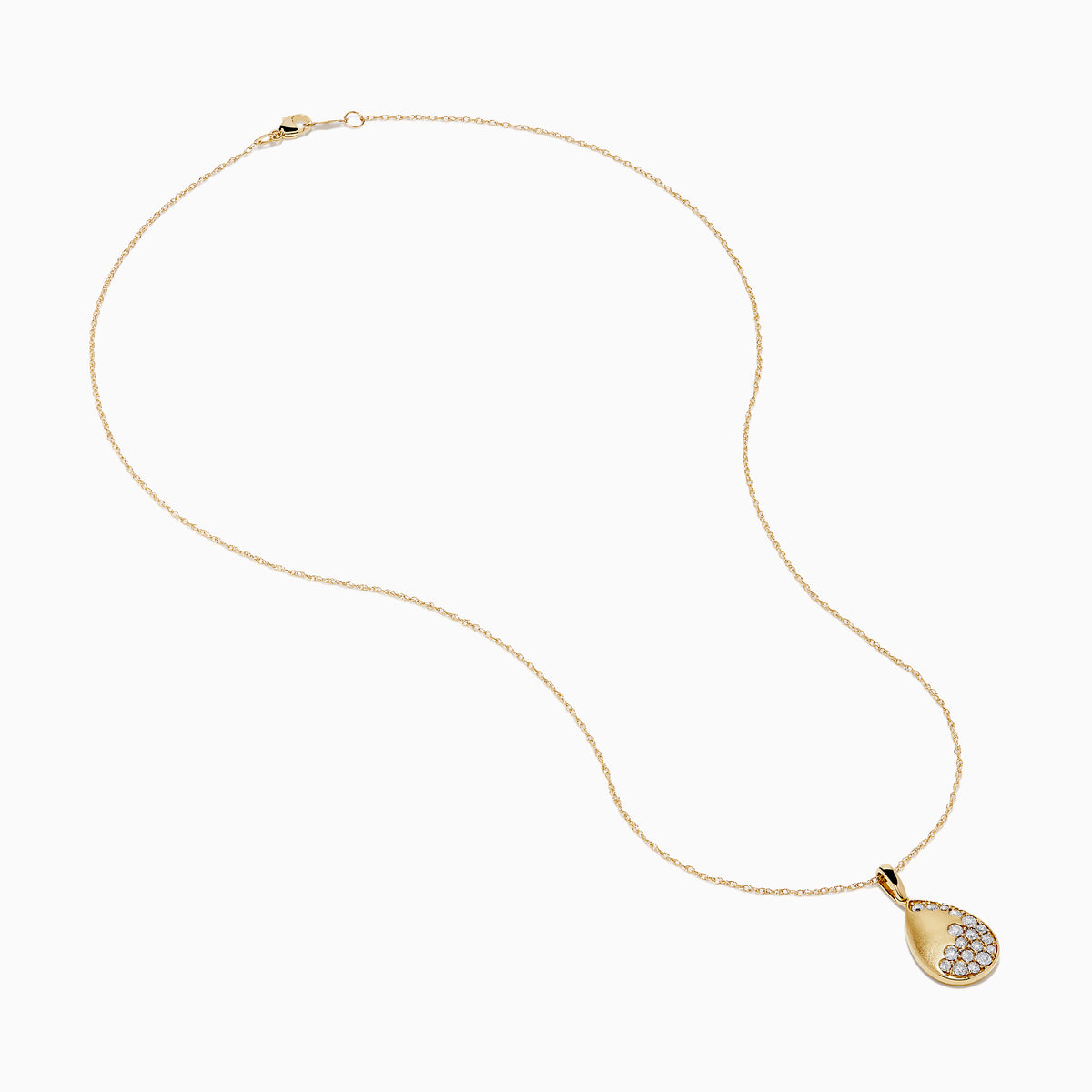 The 14K Yellow Gold Scattered Diamond Pendant features a teardrop-shaped diamond pendant partially encrusted with scattered diamonds, suspended from a delicate gold chain against a white background.