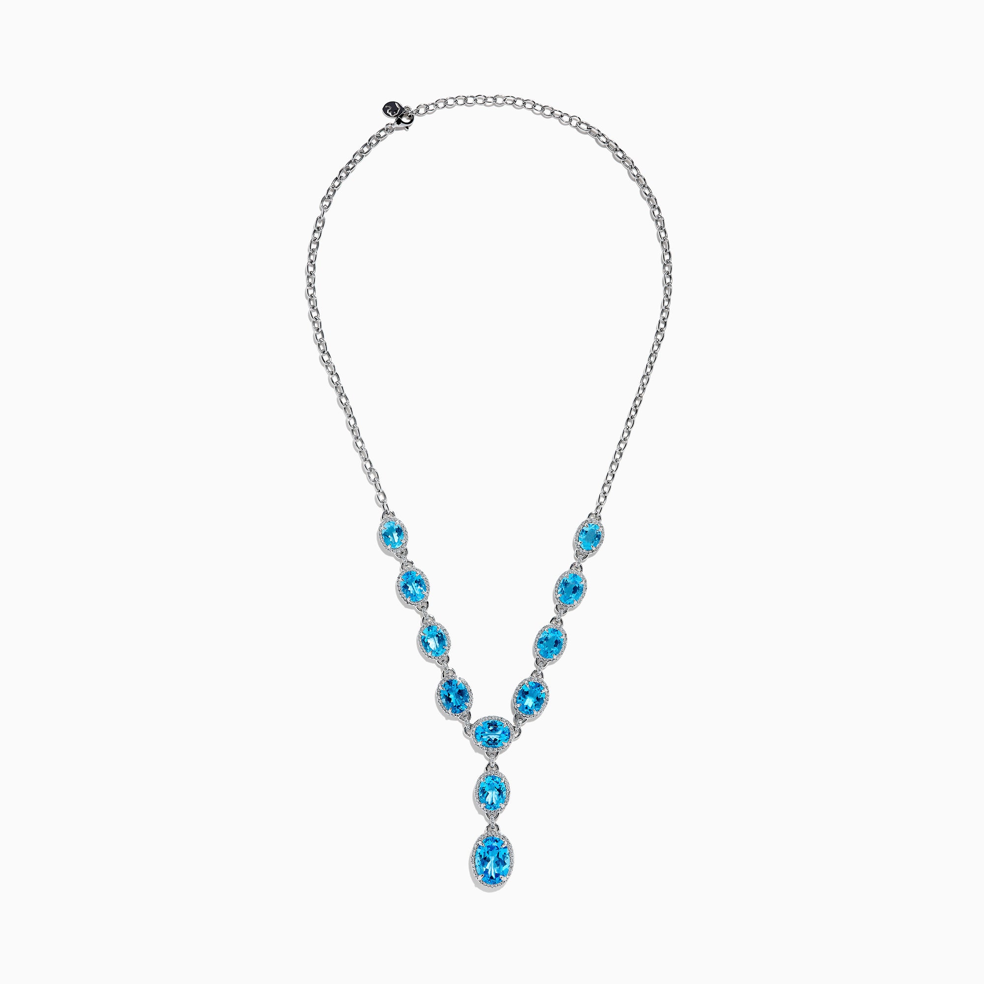 A close-up of the Ocean Bleu 14K White Gold Blue Topaz and Diamond Lavaliere Necklace featuring three oval blue topaz gemstones and diamonds in a vertical drop pendant, shown against a plain white background.