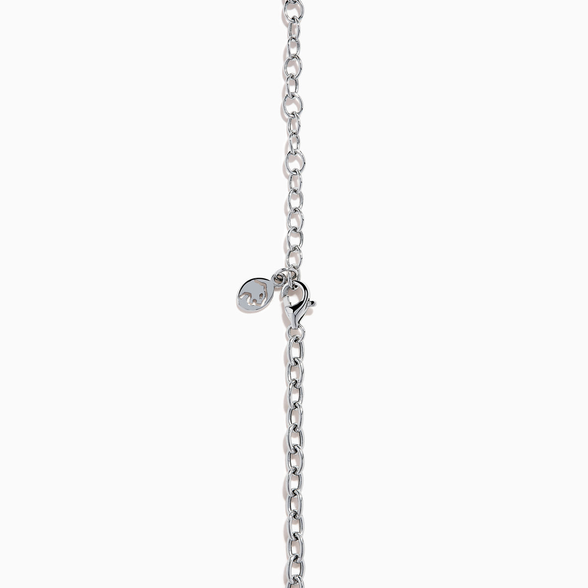 A close-up of the Ocean Bleu 14K White Gold Blue Topaz and Diamond Lavaliere Necklace featuring three oval blue topaz gemstones and diamonds in a vertical drop pendant, shown against a plain white background.