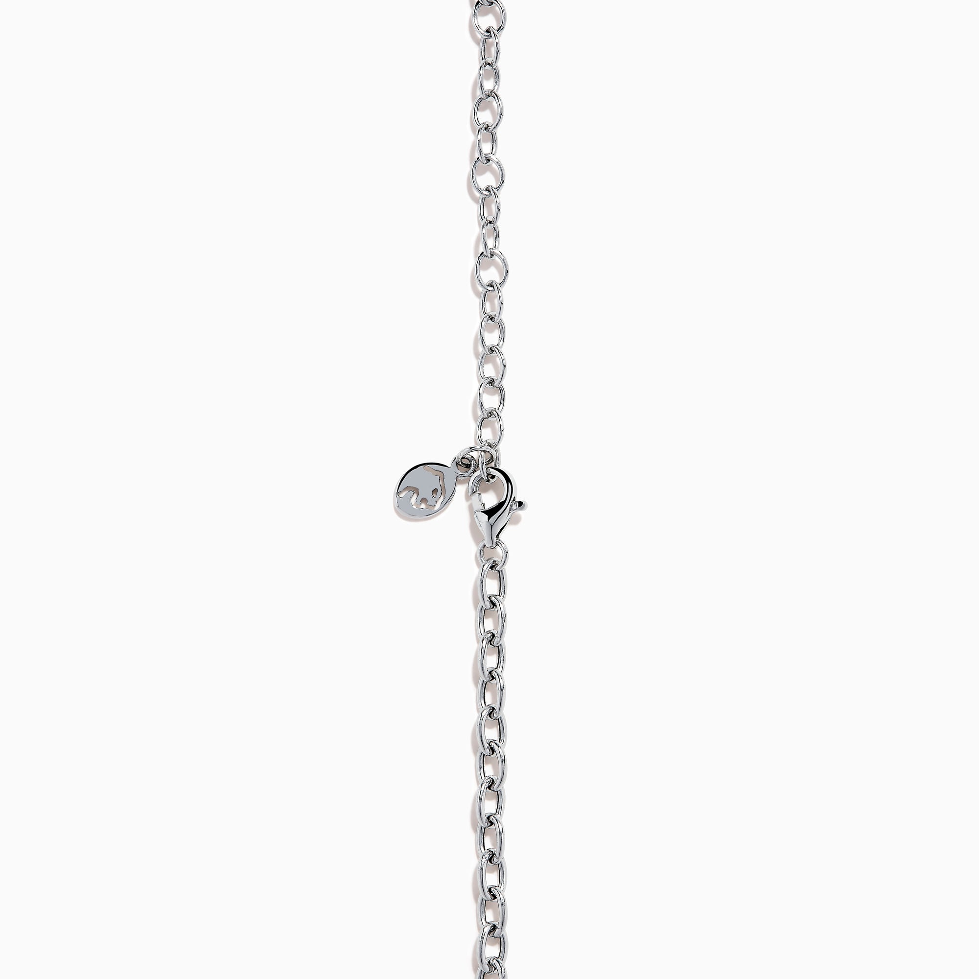 A close-up of the Ocean Bleu 14K White Gold Blue Topaz and Diamond Lavaliere Necklace featuring three oval blue topaz gemstones and diamonds in a vertical drop pendant, shown against a plain white background.
