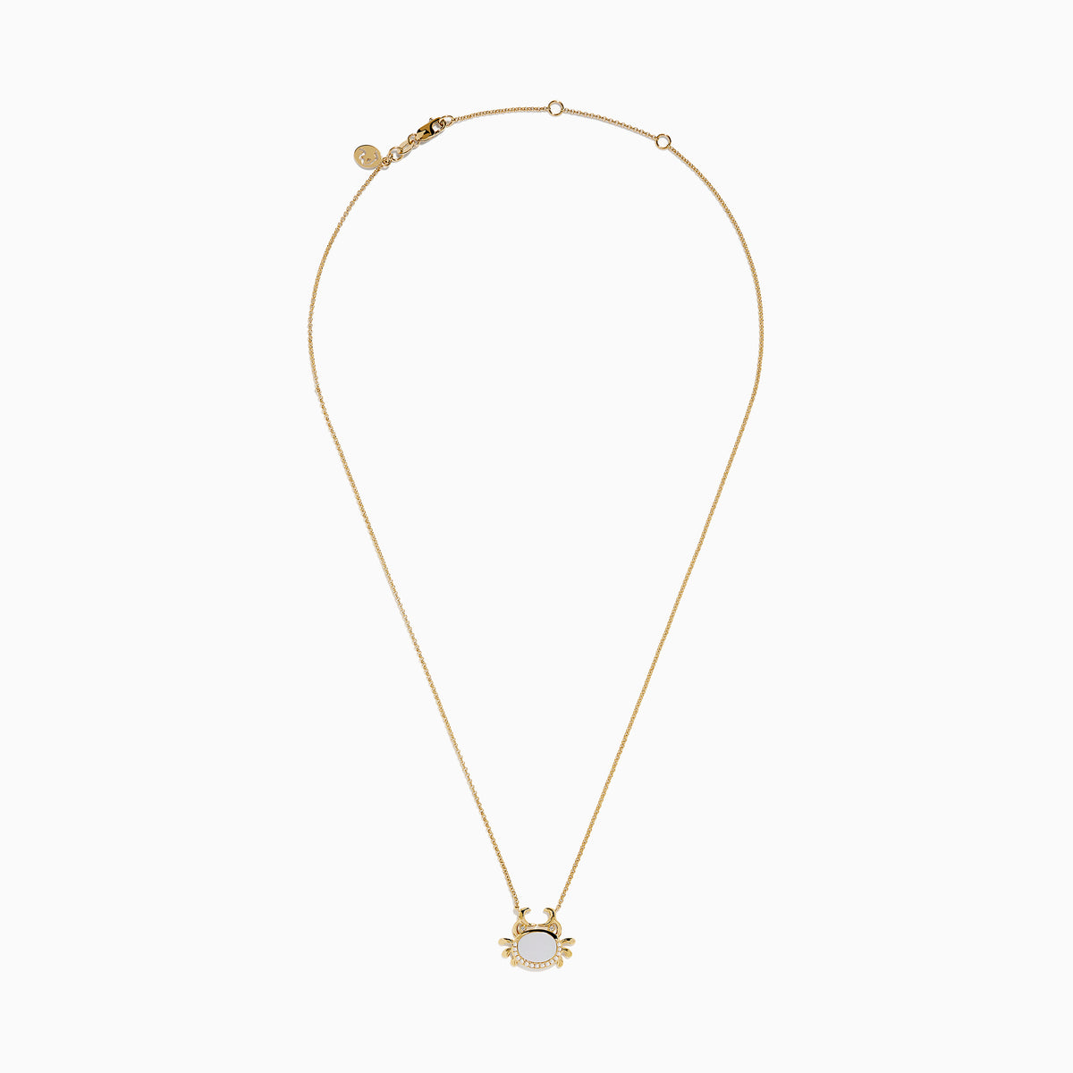 The Seaside 14K Yellow Gold Mother Of Pearl and Diamond Crab Necklace features a white oval mother of pearl center, shimmering diamond accents, and a charming crab pendant on a delicate yellow gold chain.