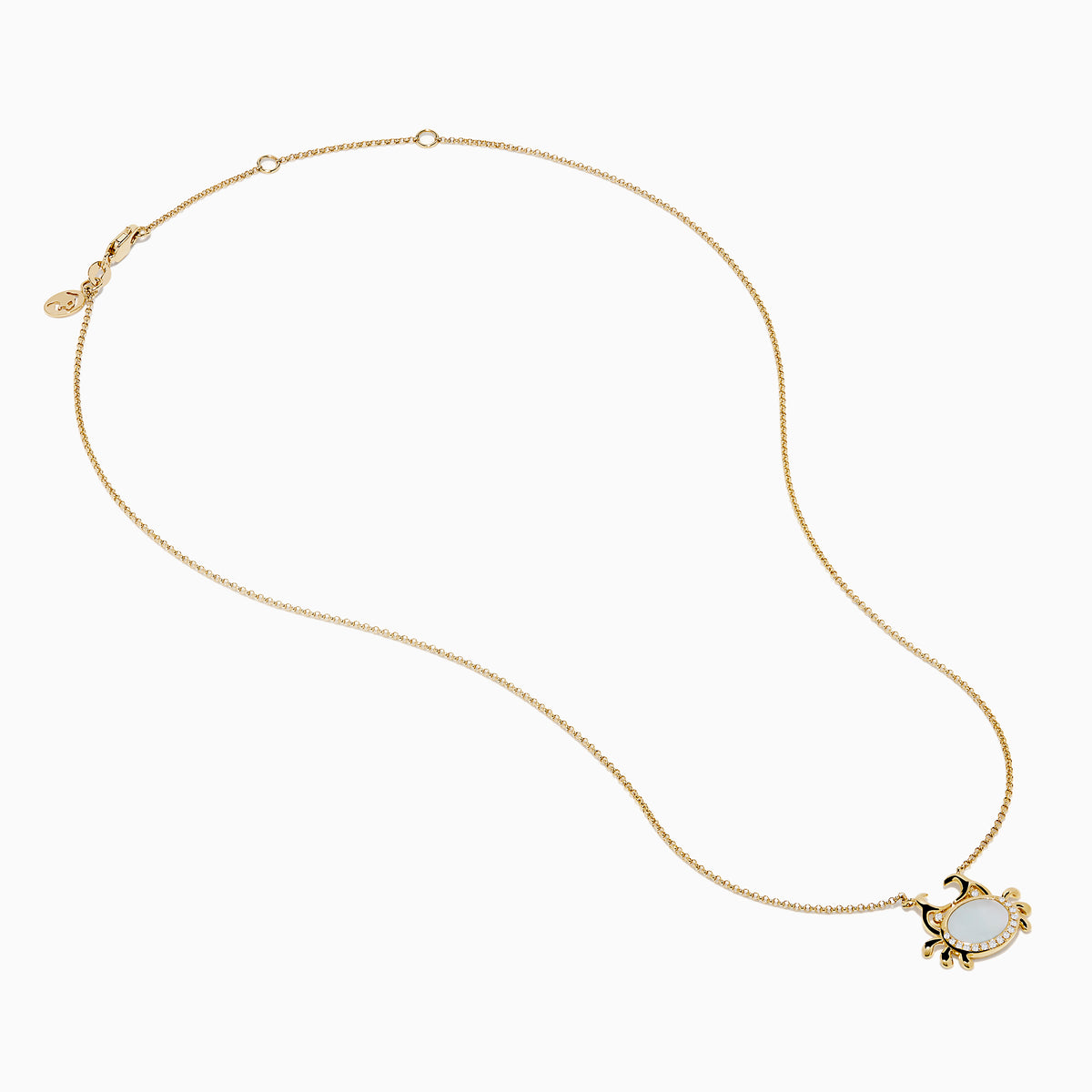 The Seaside 14K Yellow Gold Mother Of Pearl and Diamond Crab Necklace features a white oval mother of pearl center, shimmering diamond accents, and a charming crab pendant on a delicate yellow gold chain.