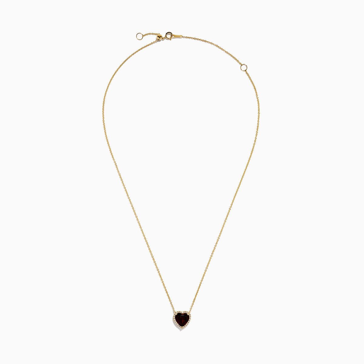 The 14K Yellow Gold Garnet and Diamond Halo Heart Pendant Necklace features a deep red garnet heart framed by a sparkling diamond halo on a yellow gold chain.