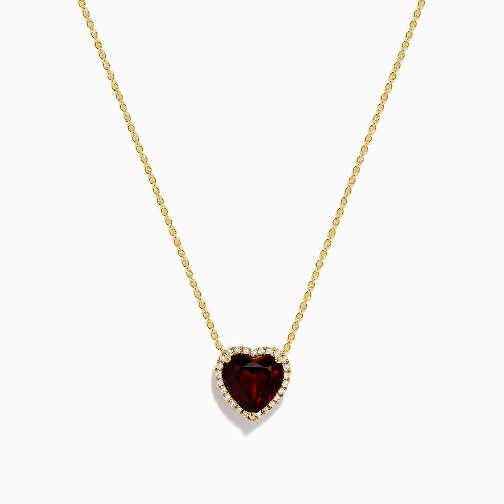 The 14K Yellow Gold Garnet and Diamond Halo Heart Pendant Necklace features a deep red garnet heart framed by a sparkling diamond halo on a yellow gold chain.