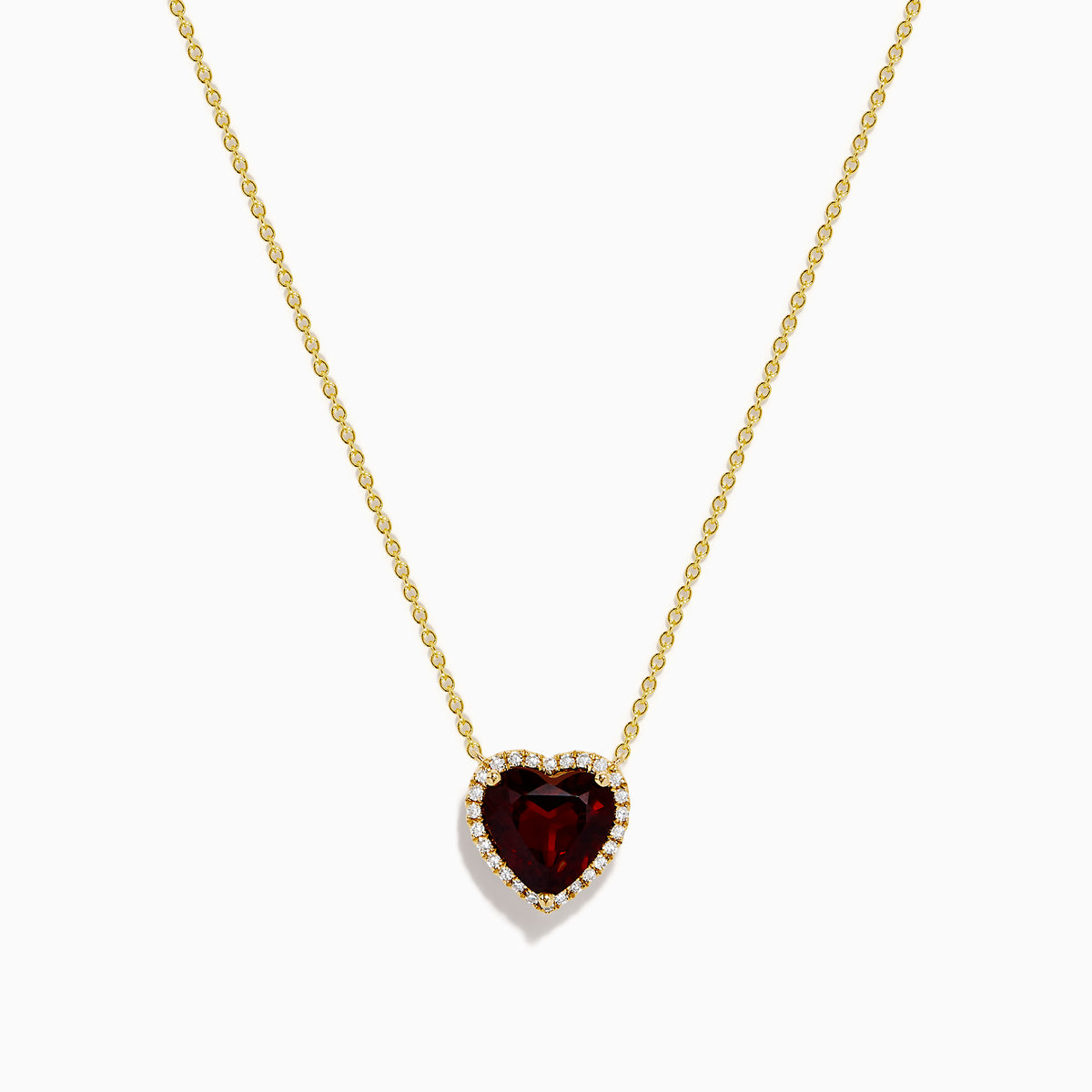 The 14K Yellow Gold Garnet and Diamond Halo Heart Pendant Necklace features a deep red garnet heart framed by a sparkling diamond halo on a yellow gold chain.