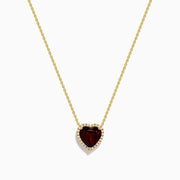 The 14K Yellow Gold Garnet and Diamond Halo Heart Pendant Necklace features a deep red garnet heart framed by a sparkling diamond halo on a yellow gold chain.