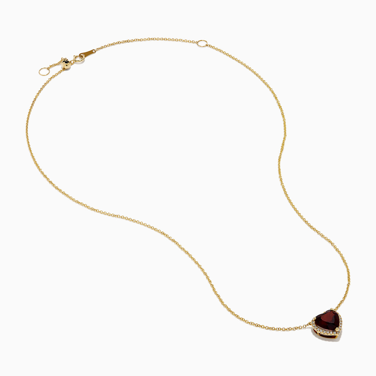 The 14K Yellow Gold Garnet and Diamond Halo Heart Pendant Necklace features a deep red garnet heart framed by a sparkling diamond halo on a yellow gold chain.