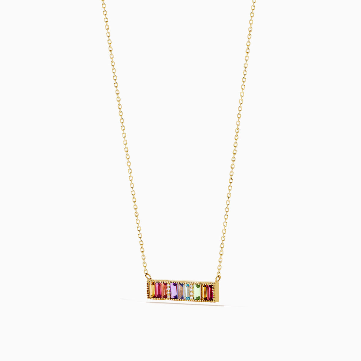 The Mosaic 14K Yellow Gold Multi Color Gemstone and Diamond Collar Bone Bar Necklace features a horizontal bar pendant set with five baguette-cut rainbow gemstones: red, purple, blue, green, and yellow.