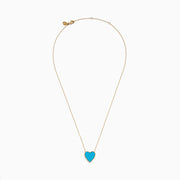 The 14K Gold Turquoise and Diamond Reversible Heart Necklace showcases a bold turquoise heart pendant framed in gold, displayed on a white background.