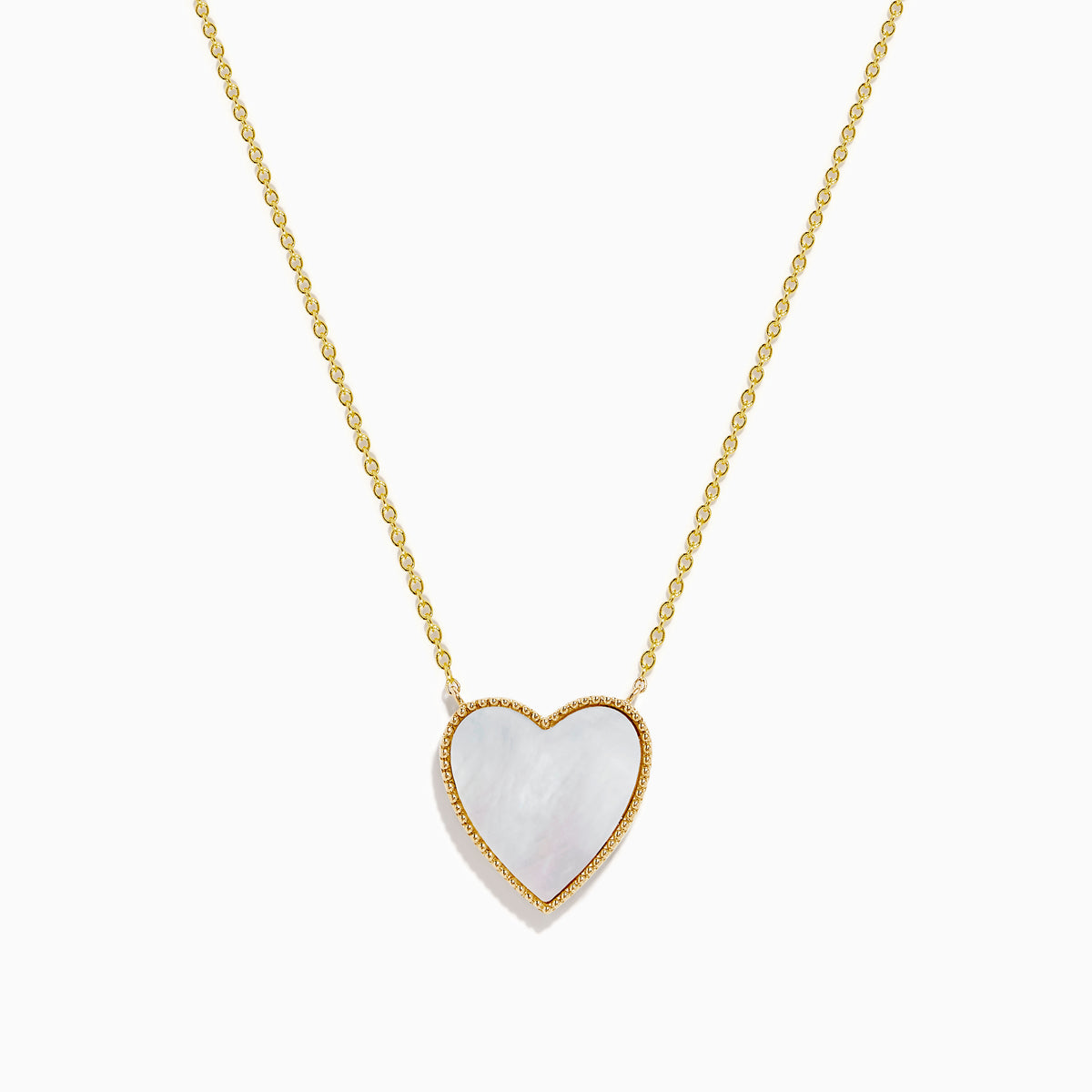 14K Gold Mother of Pearl and Diamond Reversible Heart Necklace featuring a large heart-shaped pendant with gold detailing, shown on a plain white background.