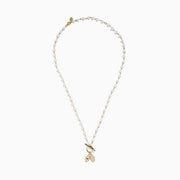 The 14K Yellow Gold Fresh Water Pearl and Diamond Evil Eye Necklace features pearl beads, a gold toggle clasp, and two gold charms: a black-centered eye and a hand encrusted with diamond-like stones.