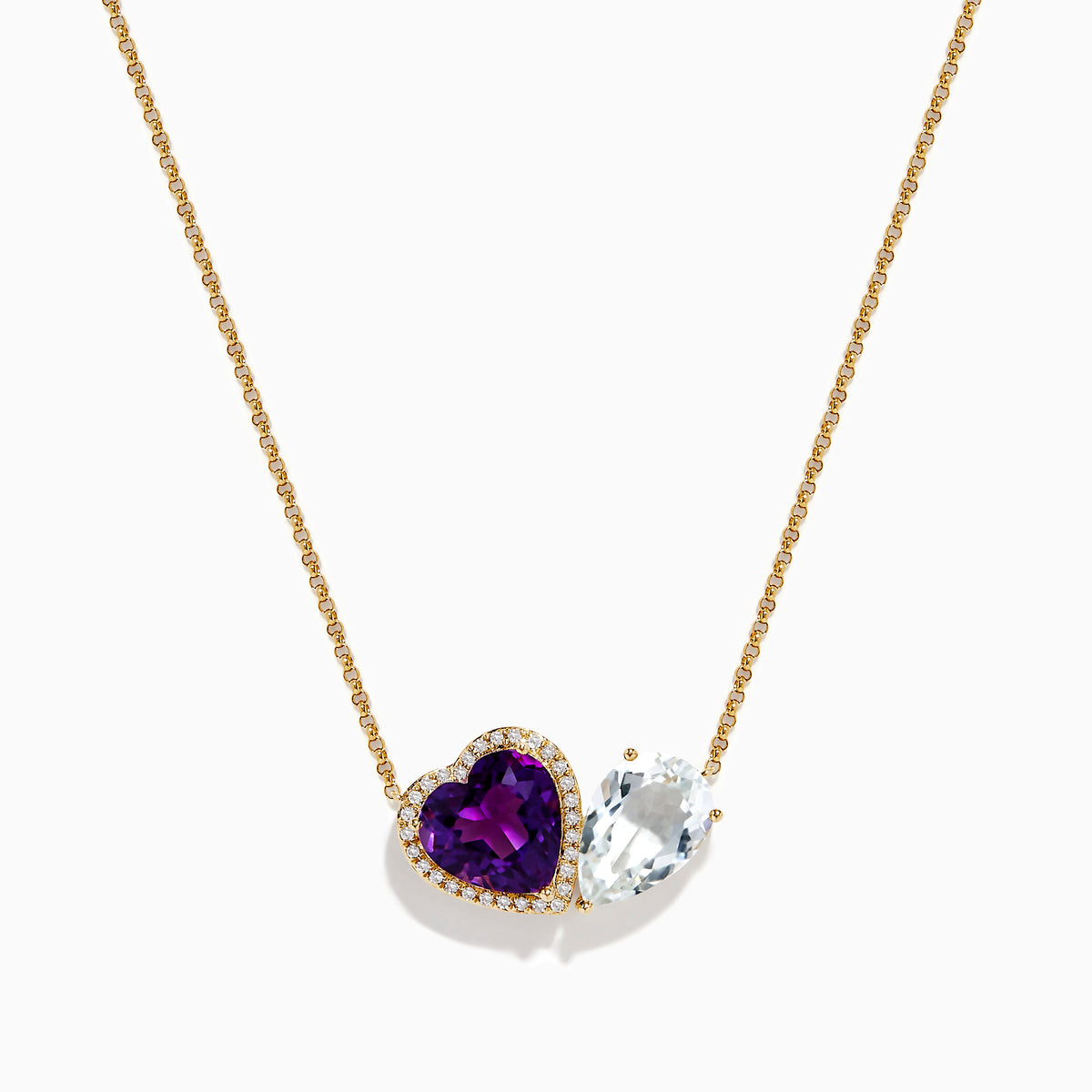 The 14K Yellow Gold Amethyst, White Topaz, and Diamond Necklace features two heart pendants: an amethyst surrounded by diamonds and a white topaz, both elegantly hanging side by side.