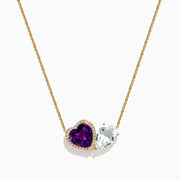 The 14K Yellow Gold Amethyst, White Topaz, and Diamond Necklace features two heart pendants: an amethyst surrounded by diamonds and a white topaz, both elegantly hanging side by side.