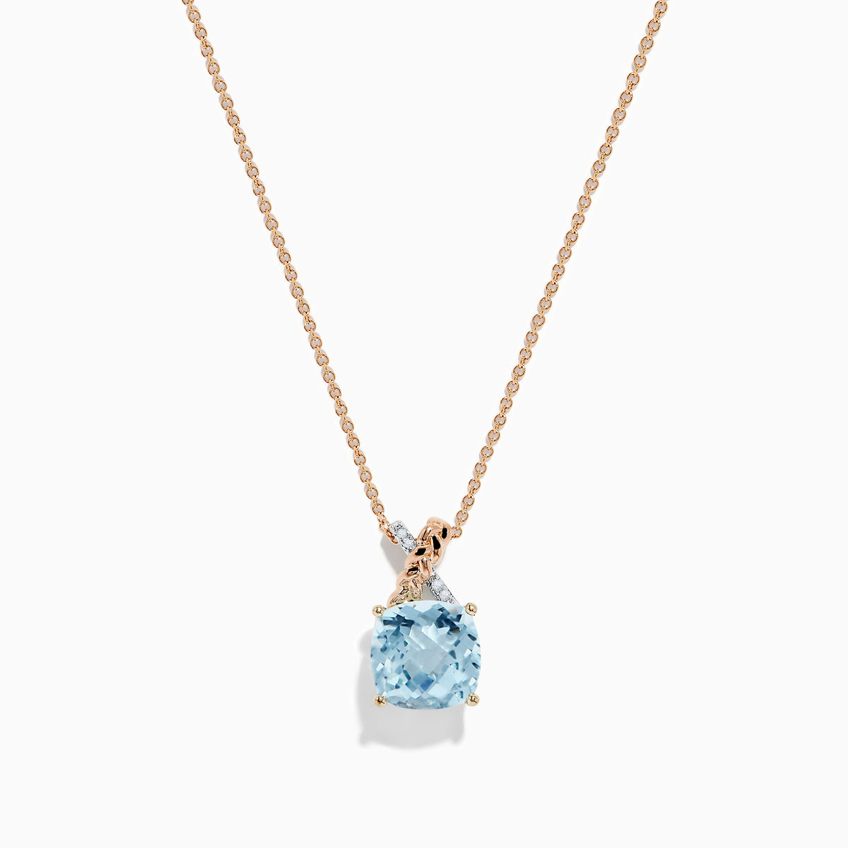 The Aquarius Pendant features a cushion-cut aquamarine set in 14K rose and white gold with diamonds, displayed on a delicate chain against a white background.