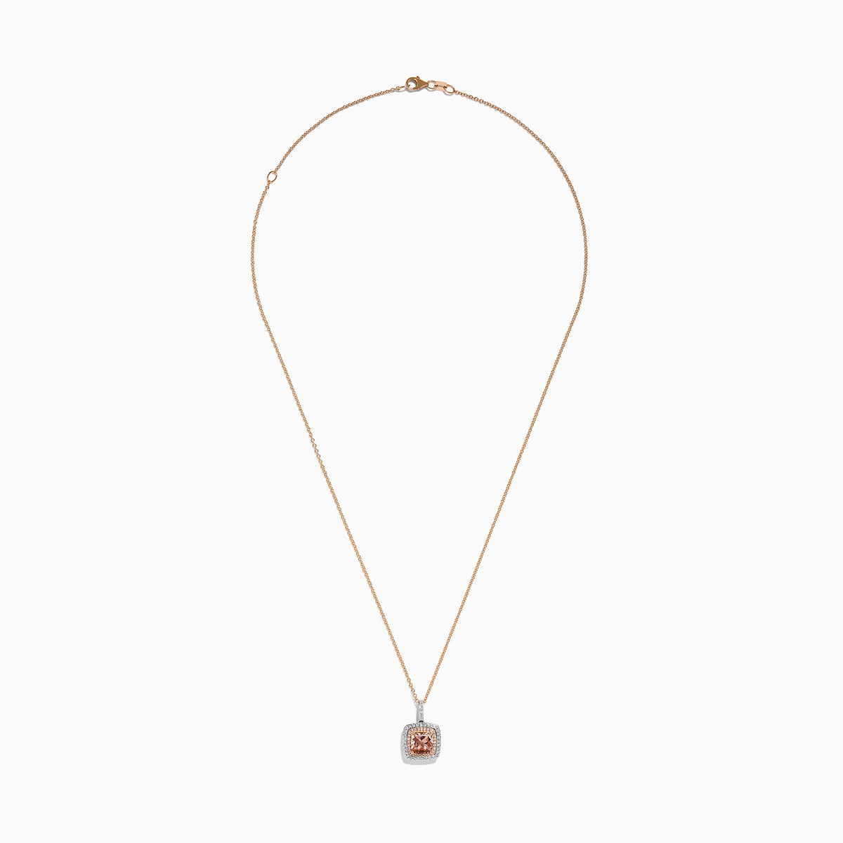 The 14K Two Tone Gold Morganite and Diamond Pendant features a cushion-cut peach morganite surrounded by sparkling diamonds, set in a blend of rose and white gold for an elegant, refined look.