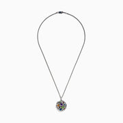 The Mosaic 925 Sterling Silver Diamond is a pendant necklace with a round design, displaying colorful gemstones—blue, green, orange, purple, and red—on a textured sterling silver background.