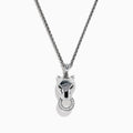 The Signature Sterling Silver Tsavorite and Diamond Panther Pendant showcases a stylized panther head holding a diamond-encrusted ring, set against a plain white background.
