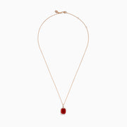 An elegant gold chain necklace with a cushion-cut red gemstone pendant and white diamonds—perfectly complements the Aurora 14K Rose Gold Fire Opal and Diamond Ring.