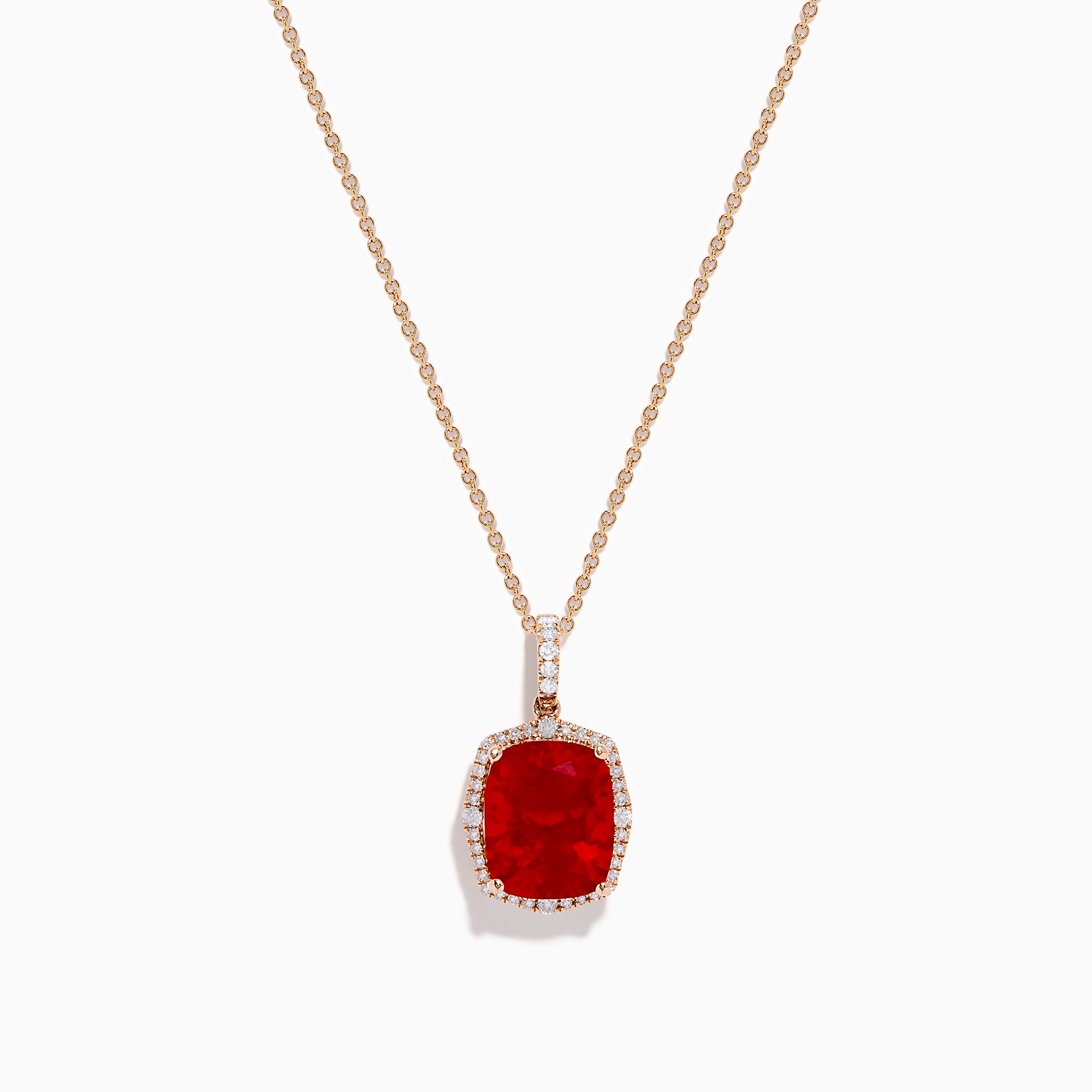An elegant gold chain necklace with a cushion-cut red gemstone pendant and white diamonds—perfectly complements the Aurora 14K Rose Gold Fire Opal and Diamond Ring.