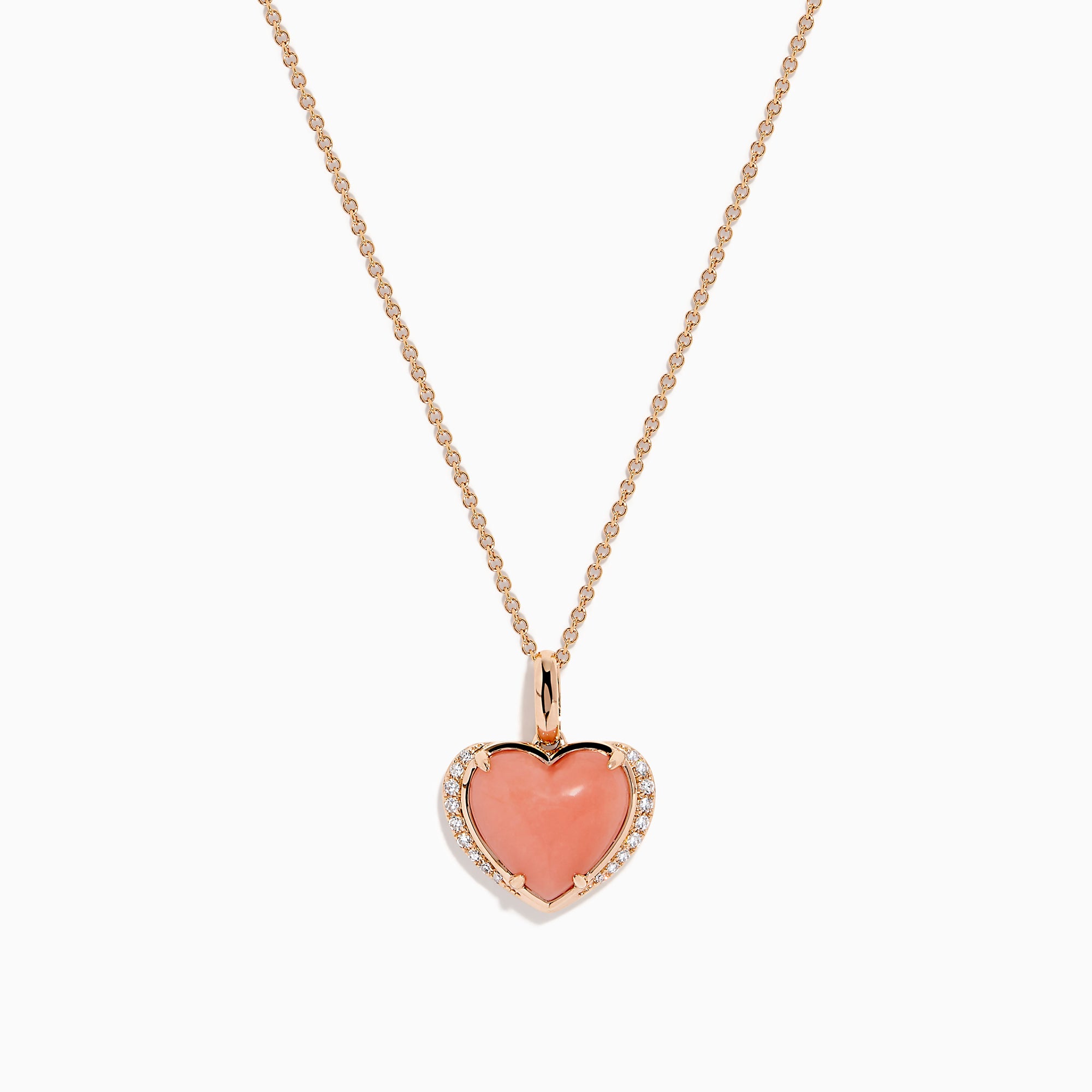 The 14K Rose Gold Pink Opal and Diamond Heart Pendant features a pink opal heart accented with sparkling diamonds on a rose gold chain.