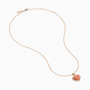 The 14K Rose Gold Pink Opal and Diamond Heart Pendant features a pink opal heart accented with sparkling diamonds on a rose gold chain.
