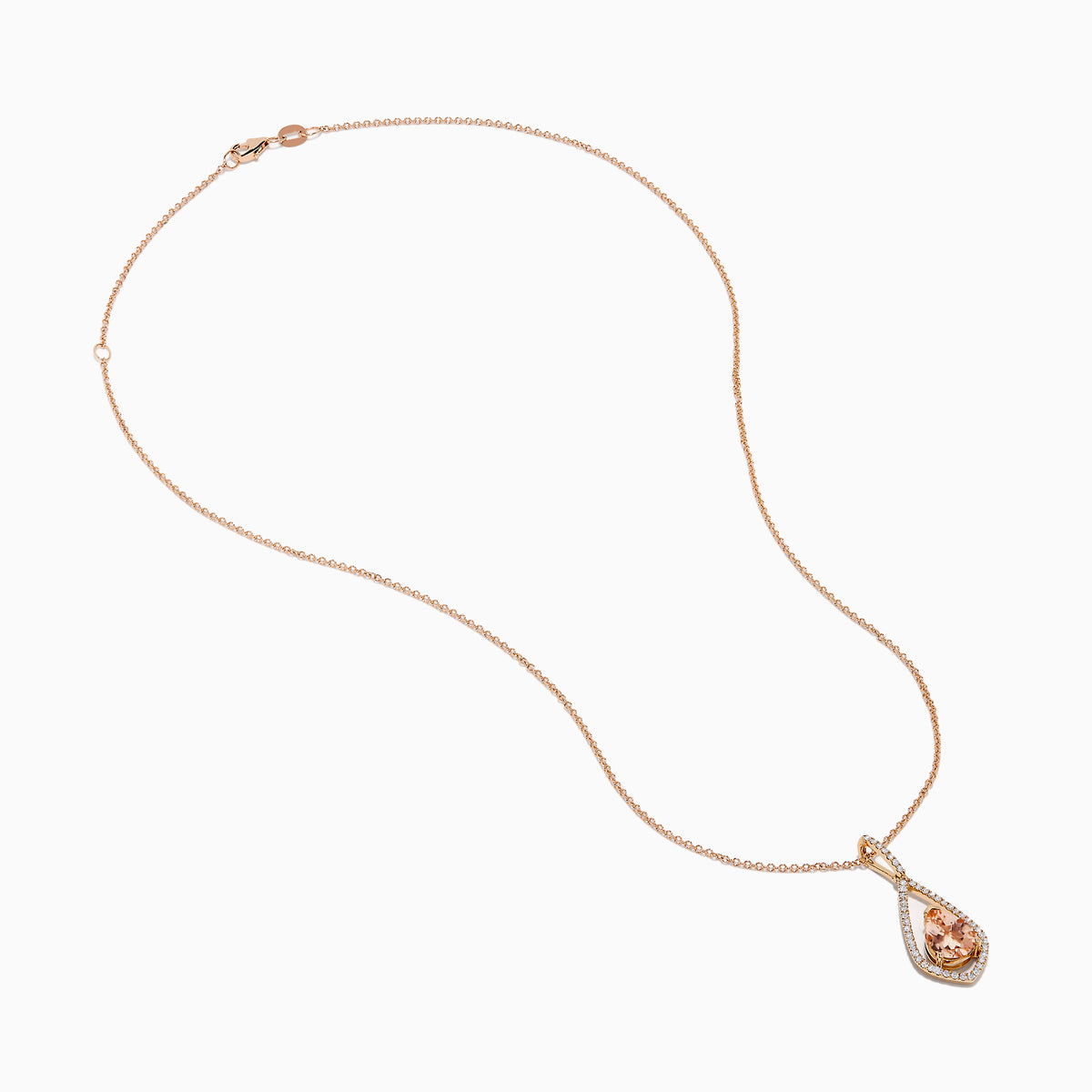 The Blush 14K Rose Gold Morganite and Diamond Pendant features a pear-shaped morganite framed by a halo of white diamonds on a delicate rose gold chain.