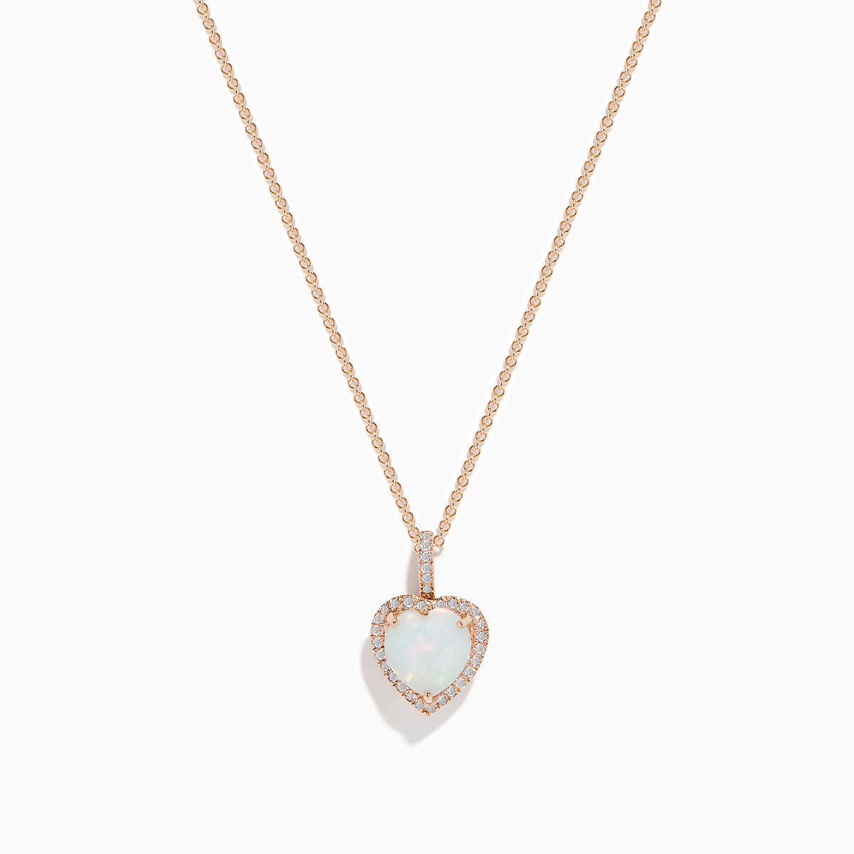 The Aurora 14K Rose Gold Diamond and Heart Opal Pendant features a delicate rose gold chain with a heart-shaped opal framed by sparkling diamonds, displayed on a white background.