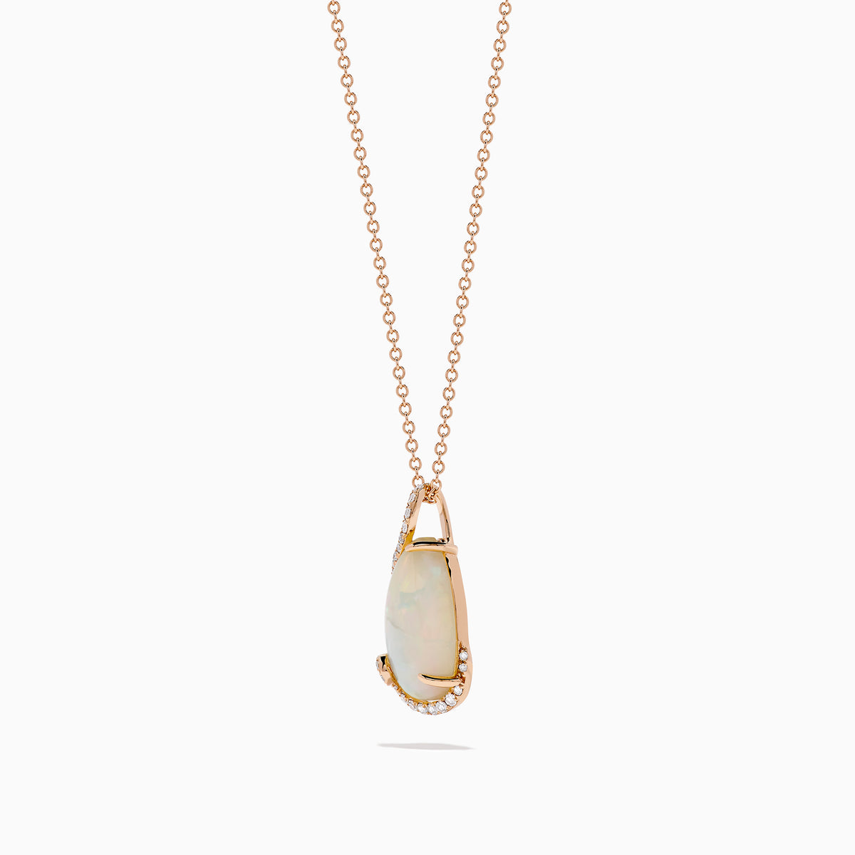 The Aurora 14K Rose Gold Opal and Diamond Pendant features a teardrop-shaped opal accented by a delicate swirl of sparkling diamonds, hanging from a fine gold chain against a plain white background.