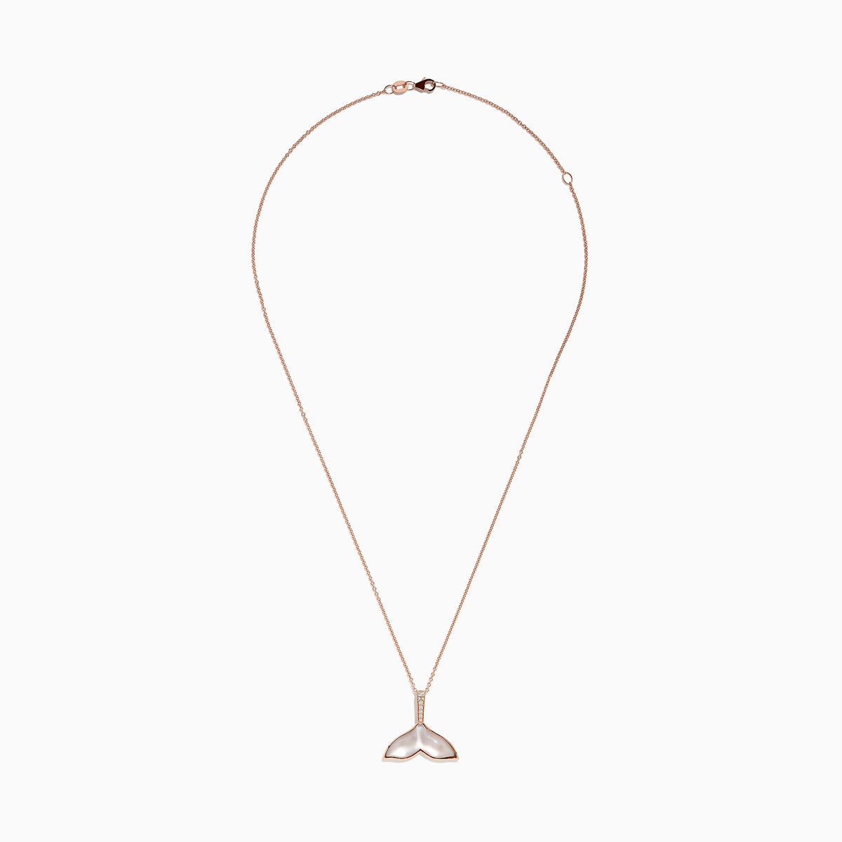 The Seaside 14K Gold Pendant features a whale’s tail design with mother-of-pearl inlay, sparkling diamonds on the bail, and a touch of quartz crystal for added elegance.