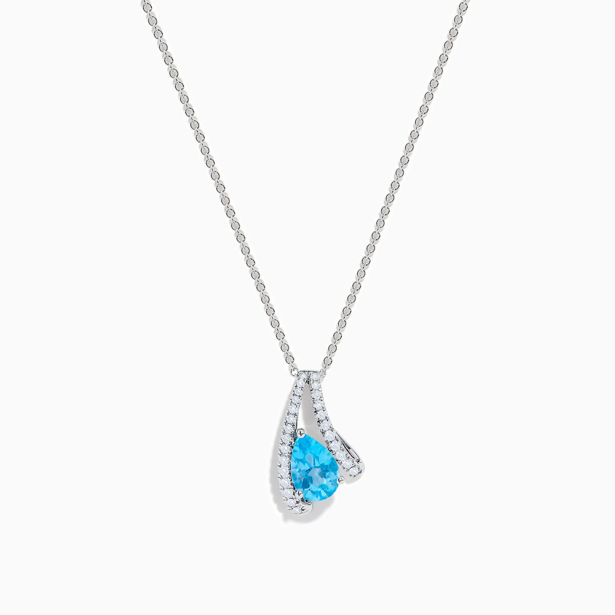The Ocean Bleu 14K White Gold Blue Topaz and Diamond Pendant features a teardrop blue topaz encircled by a curved halo of sparkling diamonds, shown against a white background.