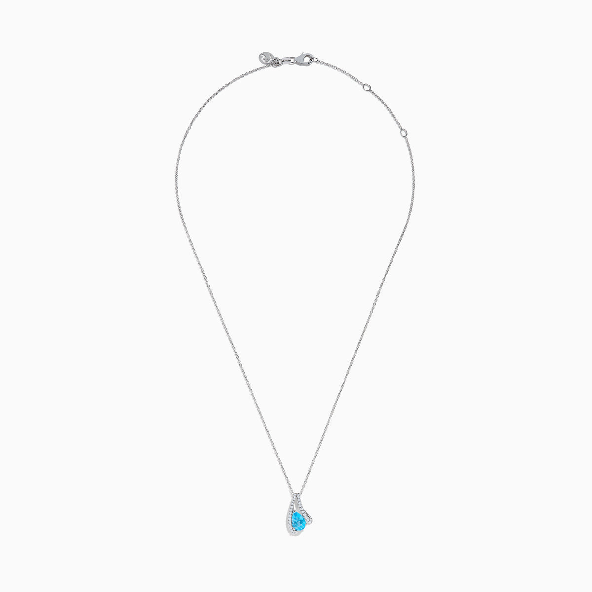 The Ocean Bleu 14K White Gold Blue Topaz and Diamond Pendant features a teardrop blue topaz encircled by a curved halo of sparkling diamonds, shown against a white background.