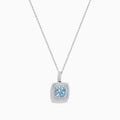 The Aquarius 14K White Gold Aquamarine and Diamond Pendant features a slim white gold chain with a square aquamarine center stone, accented by sparkling diamonds, all displayed against a white background.