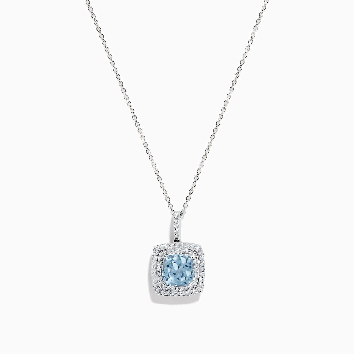 The Aquarius 14K White Gold Aquamarine and Diamond Pendant features a slim white gold chain with a square aquamarine center stone, accented by sparkling diamonds, all displayed against a white background.