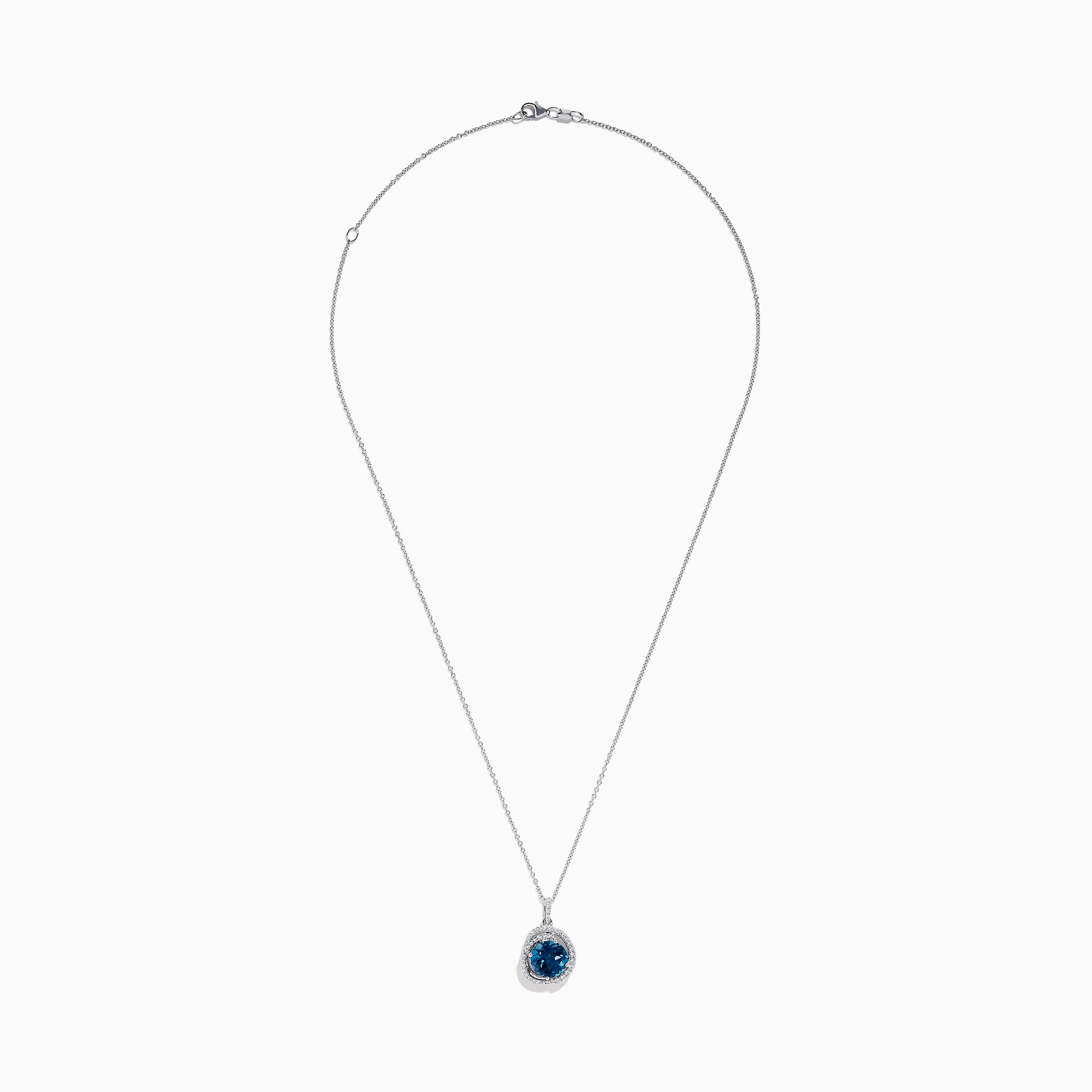 The Ocea Bleu 14K White Gold Blue Topaz and Diamond Pendant showcases a round blue topaz encircled by small diamonds, hanging from a delicate chain against a white background.