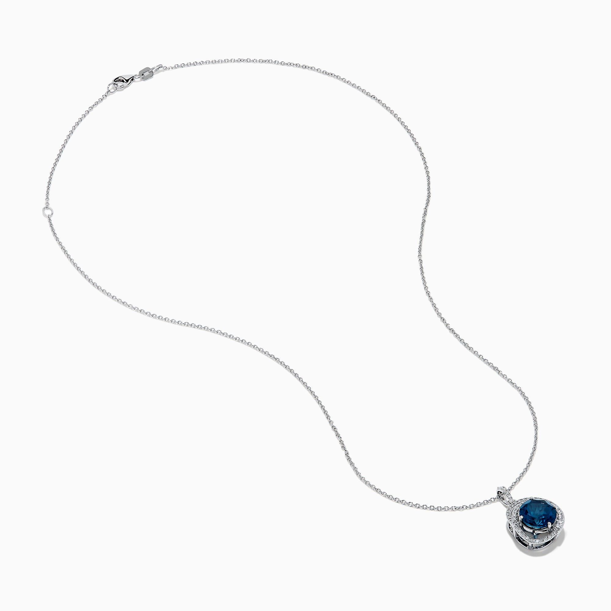 The Ocea Bleu 14K White Gold Blue Topaz and Diamond Pendant showcases a round blue topaz encircled by small diamonds, hanging from a delicate chain against a white background.