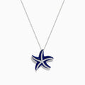 The Seaside 14K White Gold Lapis and Diamond Starfish Pendant features deep blue lapis enamel and sparkling diamonds, elegantly displayed against a plain white background.