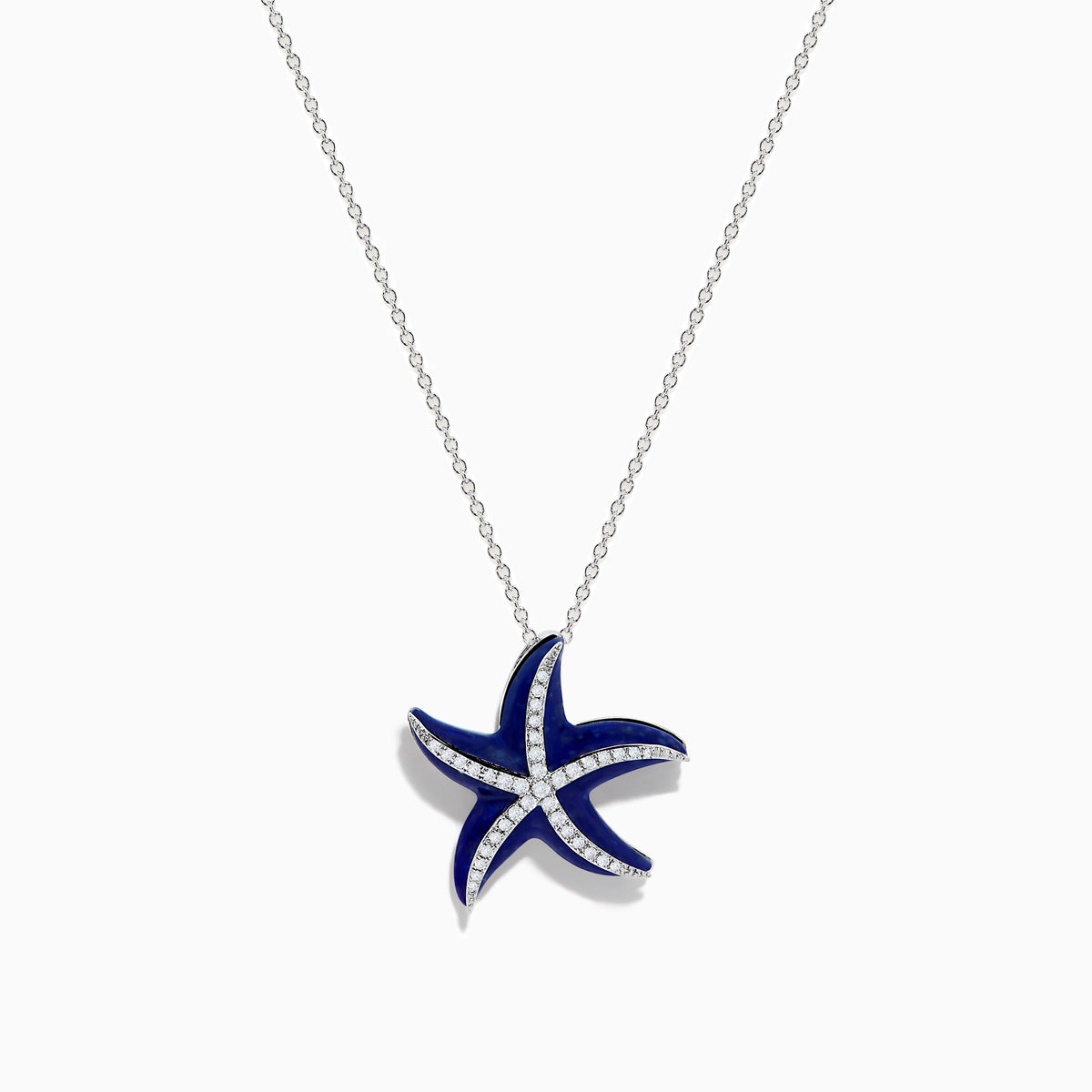 The Seaside 14K White Gold Lapis and Diamond Starfish Pendant features deep blue lapis enamel and sparkling diamonds, elegantly displayed against a plain white background.