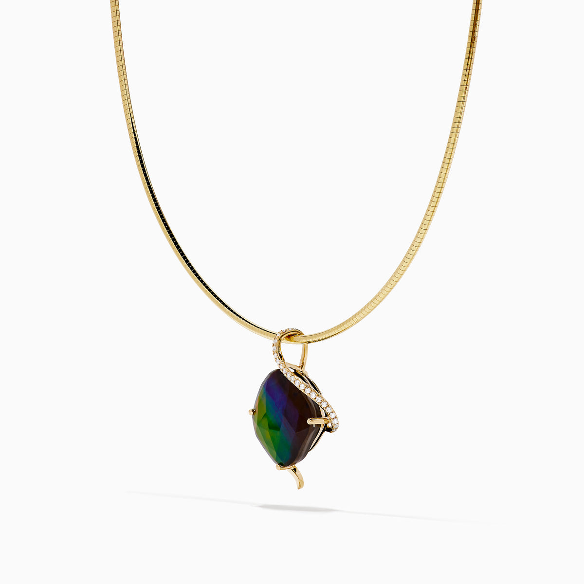 A 14K yellow gold snake chain pendant necklace featuring an ammolite and diamond, its multicolored gemstone showcased against a plain white background.