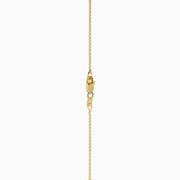The 14K Yellow Gold Opal and Diamond Pear Shaped Pendant features a teardrop opal surrounded by two rows of sparkling diamonds on a yellow gold chain, shown against a white background.