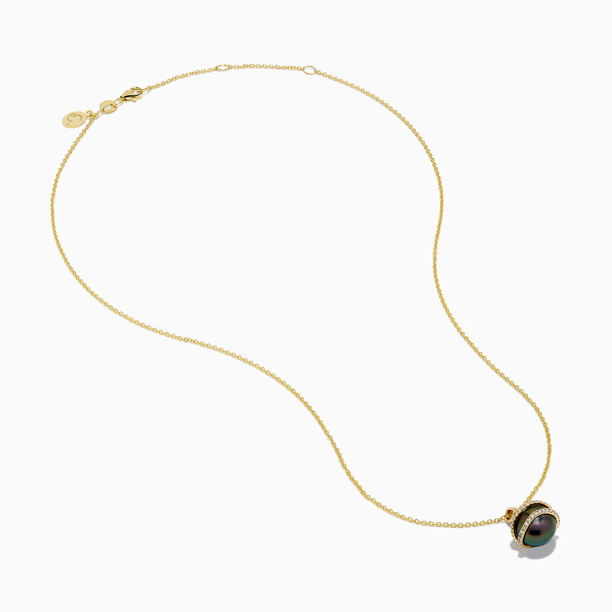 The 14K Yellow Gold Black Tahitian Pearl and Diamond Pendant features a spherical black pearl encircled by two diagonal gold bands set with small diamonds, shown against a white background.
