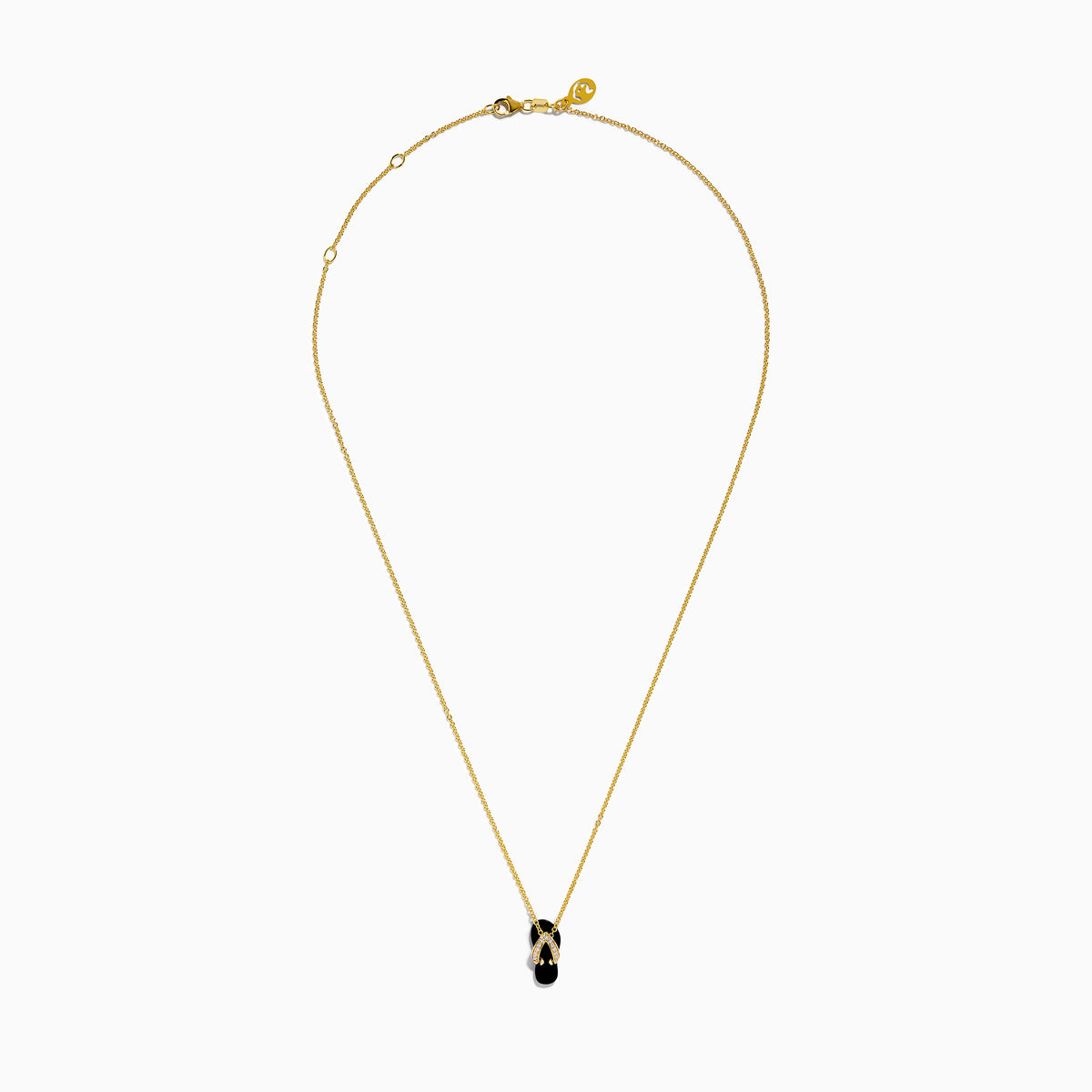 A delicate 14K yellow gold necklace features a flip flop pendant accented with onyx and diamonds, displayed against a white background.