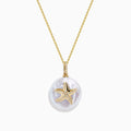 A 14K yellow gold chain necklace featuring a round freshwater pearl pendant with a diamond-adorned starfish, named the 14K Yellow Gold Fresh Water Pearl and Diamond Starfish Pendant.