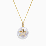 A 14K yellow gold chain necklace featuring a round freshwater pearl pendant with a diamond-adorned starfish, named the 14K Yellow Gold Fresh Water Pearl and Diamond Starfish Pendant.