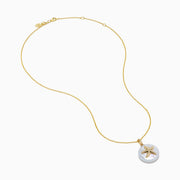 A 14K yellow gold chain necklace featuring a round freshwater pearl pendant with a diamond-adorned starfish, named the 14K Yellow Gold Fresh Water Pearl and Diamond Starfish Pendant.